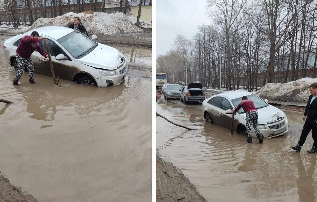В Приволжском районе на улице Кулагина разлилась огромная лужа, под которой спрятались ямы. Автомобили застряли в этой грязи. Фото: соцсети